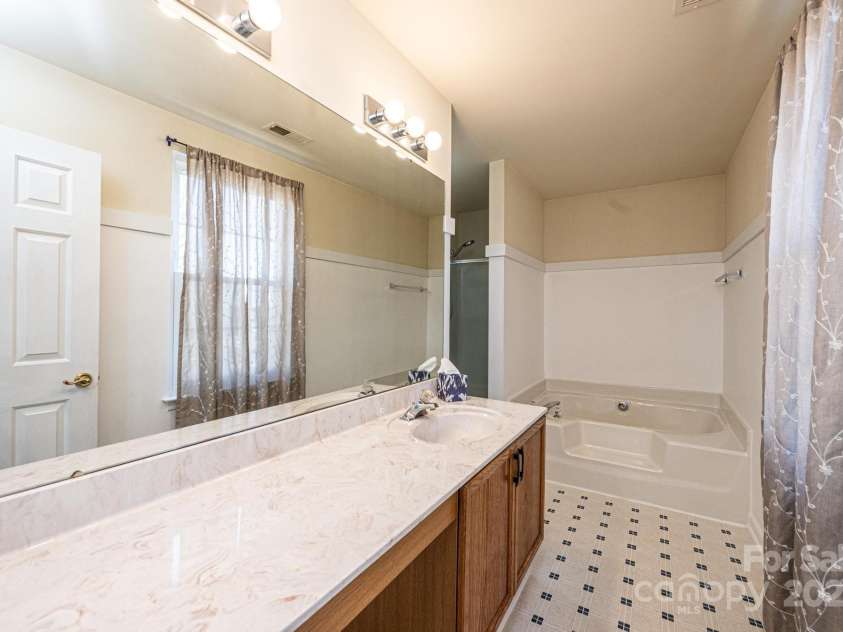 102 Brewster Court, Mooresville, NC 28115.  MLS# CAR4223330, YatesRealty ID 7417. Primary Bath