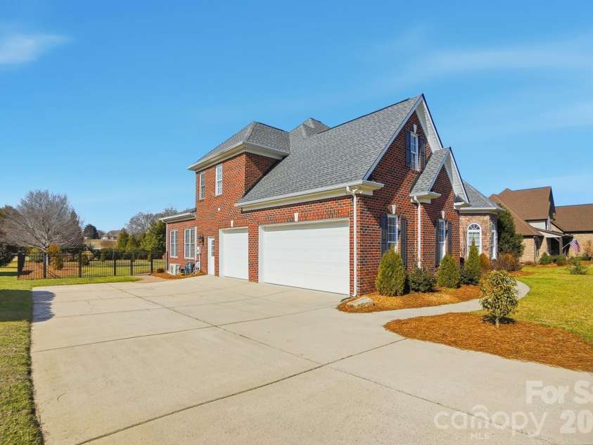 2709 Smith Field Drive, Monroe, NC 28110.  MLS# CAR4333485, YatesRealty ID 7417. 3+ Car Garage and Extended Driveway