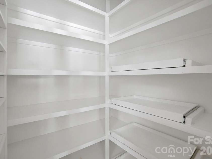 2709 Smith Field Drive, Monroe, NC 28110.  MLS# CAR4333485, YatesRealty ID 7417. Large Custom Pantry with Pull-out shelves