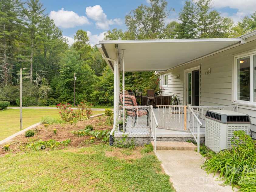 3870 Kanuga Road, Hendersonville, NC 28739.  MLS# CAR4209718, YatesRealty ID 7420. Space for flowers and veggies!