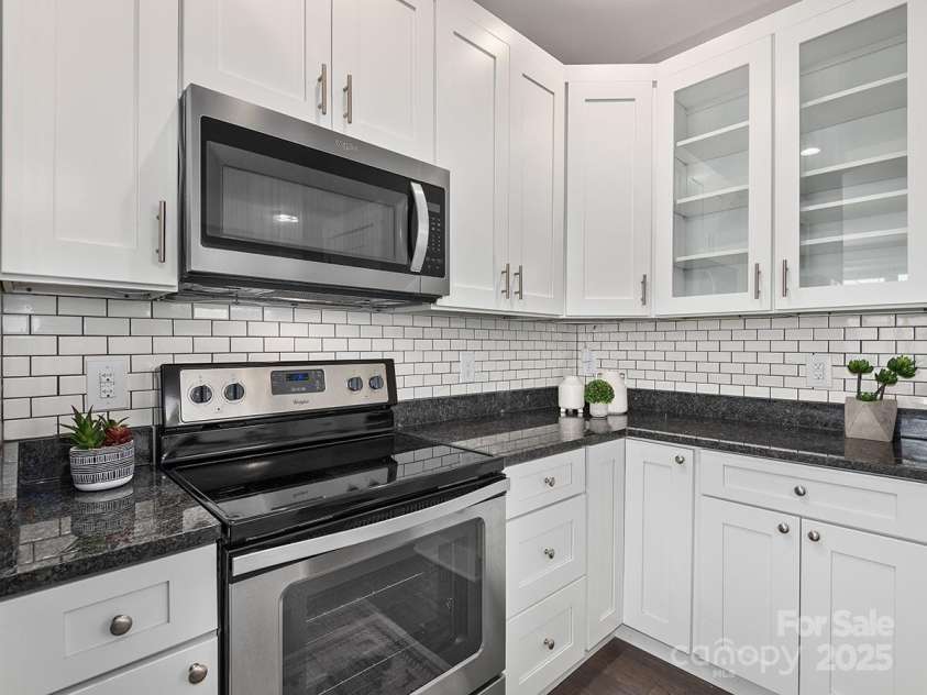 34 Walnut Lane, Asheville, NC 28804.  MLS# CAR4233293, YatesRealty ID 7421. Modern appliances and smart layout make this perfect for cooking in