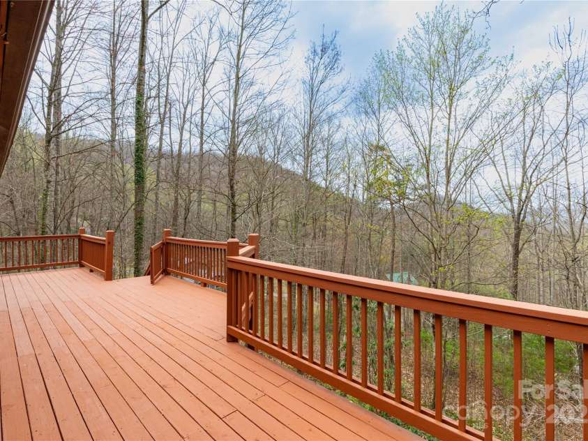 63 Wabash Drive, Sylva, NC 28779.  MLS# CAR4244141, YatesRealty ID 7425. Deck access downstairs