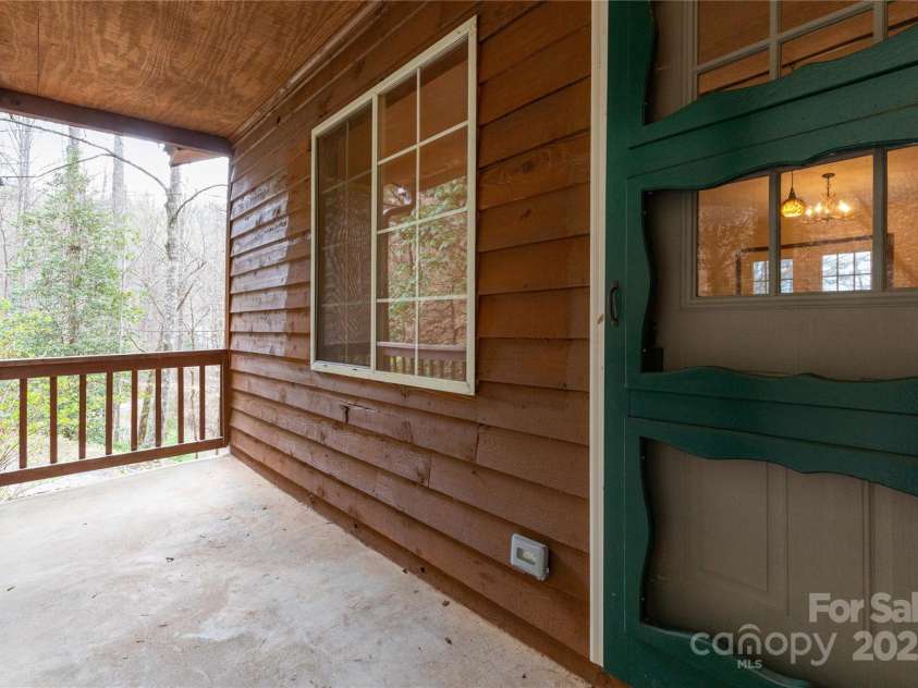 63 Wabash Drive, Sylva, NC 28779.  MLS# CAR4244141, YatesRealty ID 7425. Front door/Porch