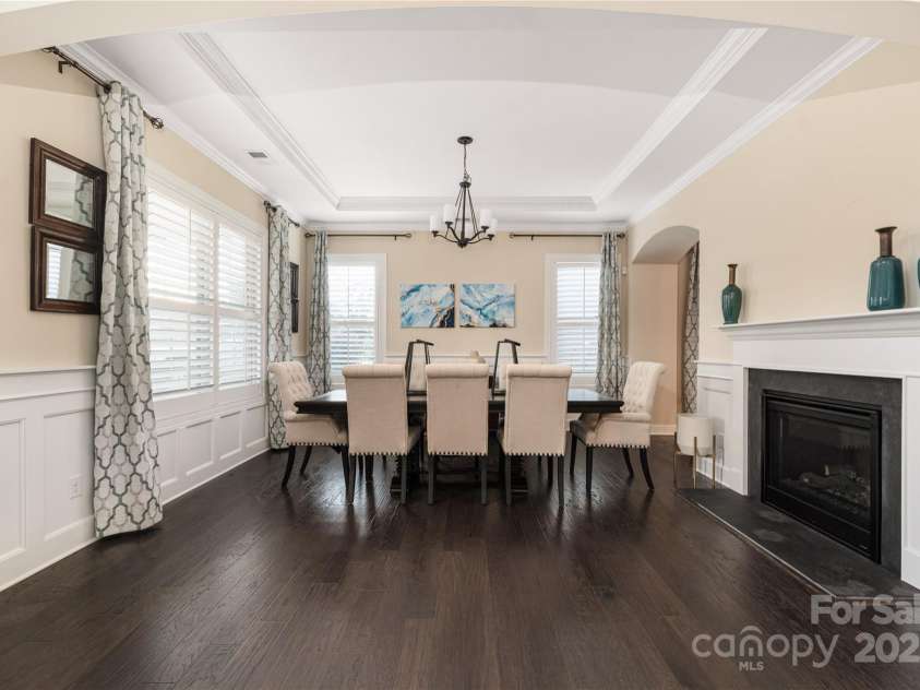 16827 Monocacy Boulevard, Huntersville, NC 28078.  MLS# CAR4188848, YatesRealty ID 7429. Formal Dining w/shared fireplace