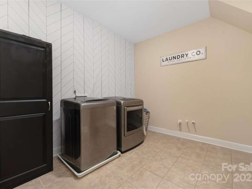 16827 Monocacy Boulevard, Huntersville, NC 28078.  MLS# CAR4188848, YatesRealty ID 7429. Upstairs Laundry