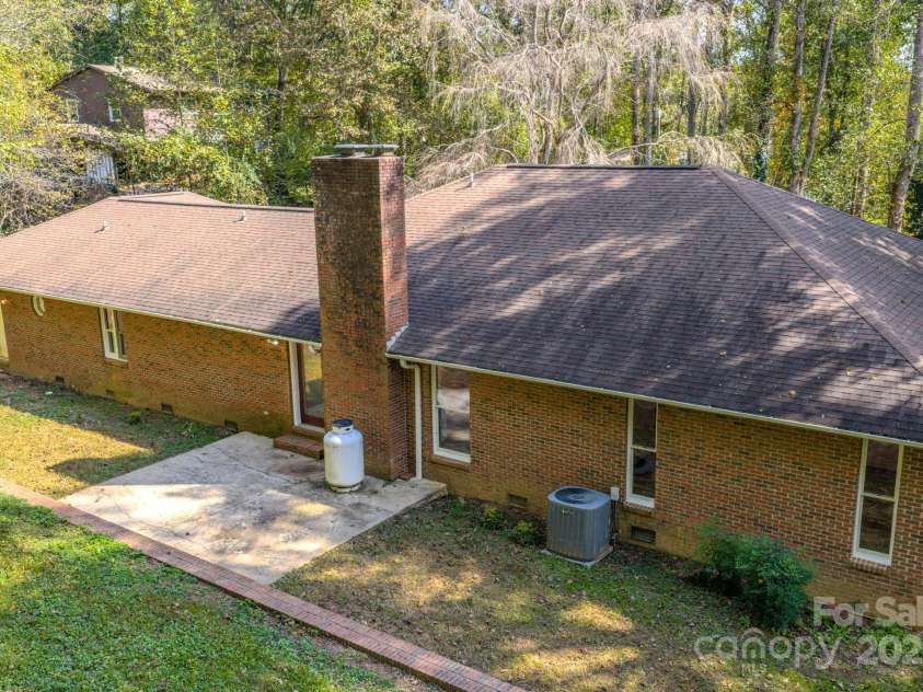 35 Byrd Road, Candler, NC 28715.  MLS# CAR4314143, YatesRealty ID 743. Back yard are with patio