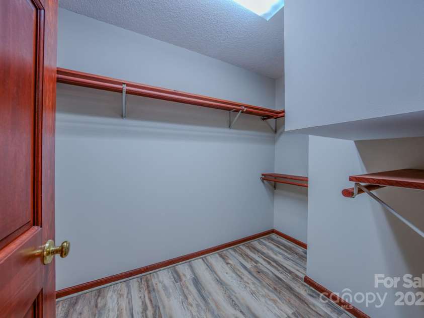 35 Byrd Road, Candler, NC 28715.  MLS# CAR4314143, YatesRealty ID 743. Bedroom 2 Walk-in Closet