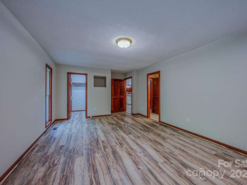 35 Byrd Road, Candler, NC 28715.  MLS# CAR4314143, YatesRealty ID 743. Bedroom 2 with walk-in closet