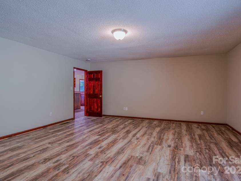 35 Byrd Road, Candler, NC 28715.  MLS# CAR4314143, YatesRealty ID 743. Large Primary bedroom