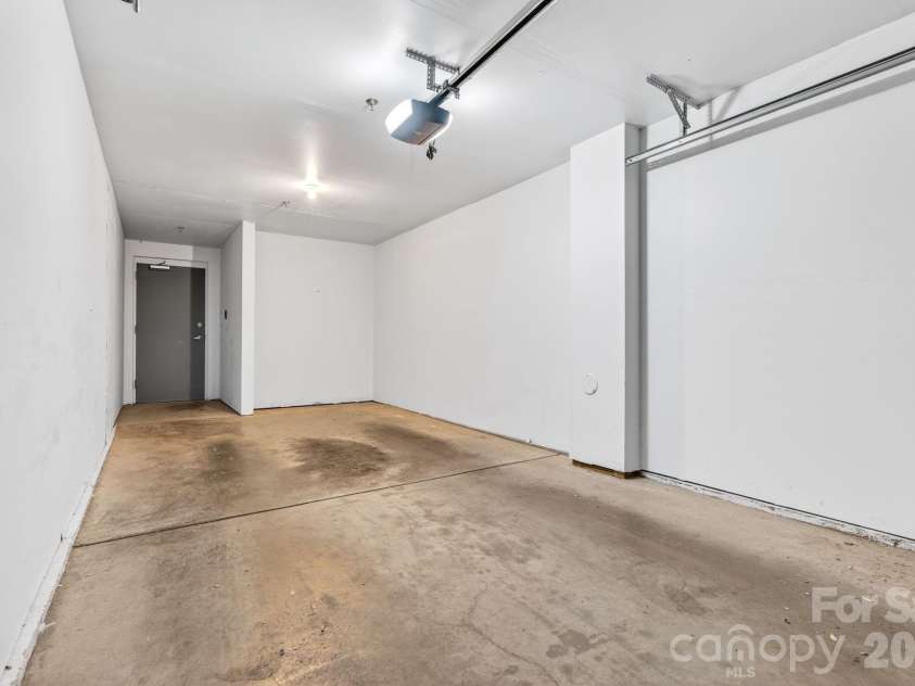 649 Raphael Place, Charlotte, NC 28205.  MLS# CAR4392516, YatesRealty ID 7431. Access interior hall from garage