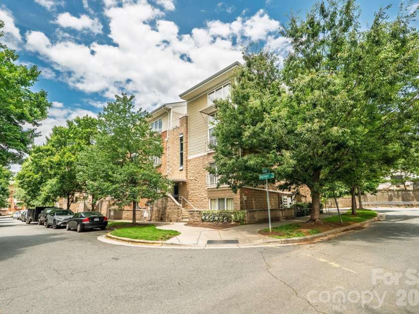 649 Raphael Place, Charlotte, NC 28205.  MLS# CAR4392516, YatesRealty ID 7431. Mature trees line the commnity