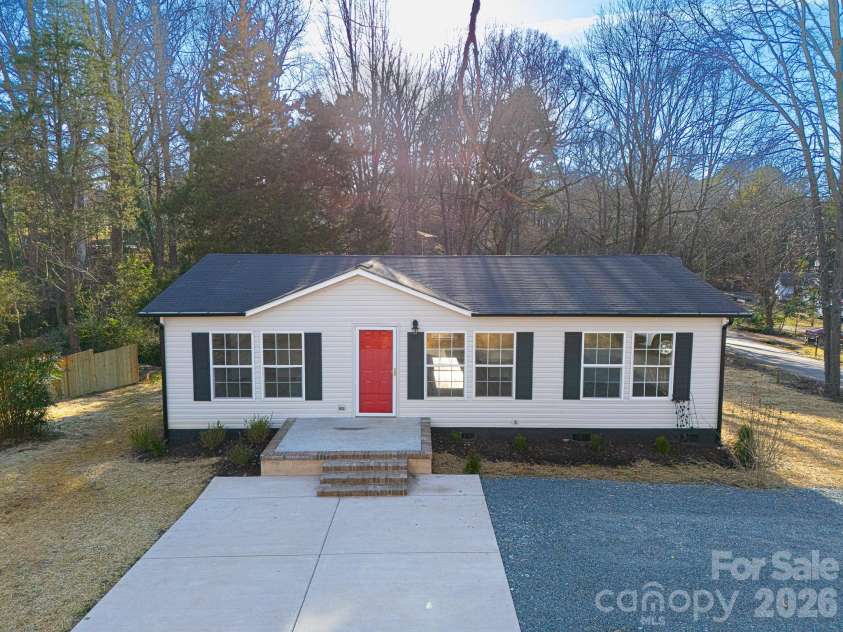 3313 Weeping Willow Drive, Concord, NC 28027.  MLS# CAR4349604, YatesRealty ID 7432. Front exterior with patio