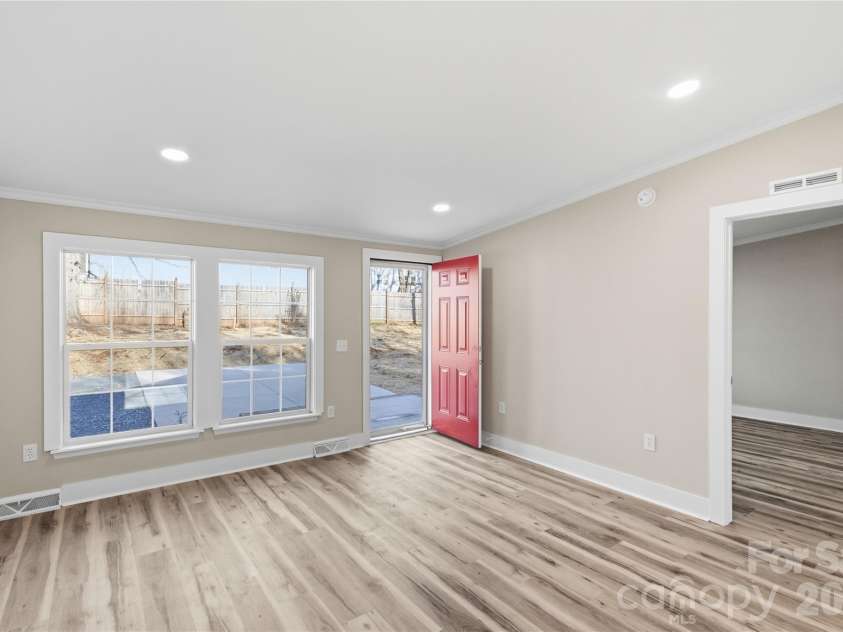3313 Weeping Willow Drive, Concord, NC 28027.  MLS# CAR4349604, YatesRealty ID 7432. Living rom view from dining area