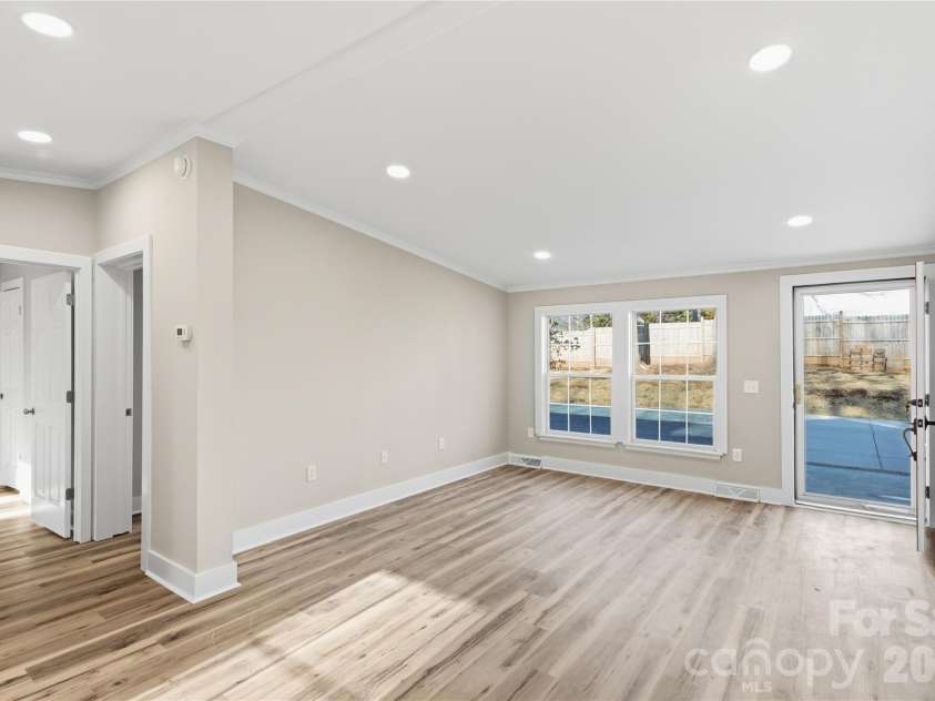 3313 Weeping Willow Drive, Concord, NC 28027.  MLS# CAR4349604, YatesRealty ID 7432. Living room view from kitchen