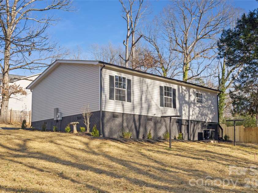 3313 Weeping Willow Drive, Concord, NC 28027.  MLS# CAR4349604, YatesRealty ID 7432. Side view