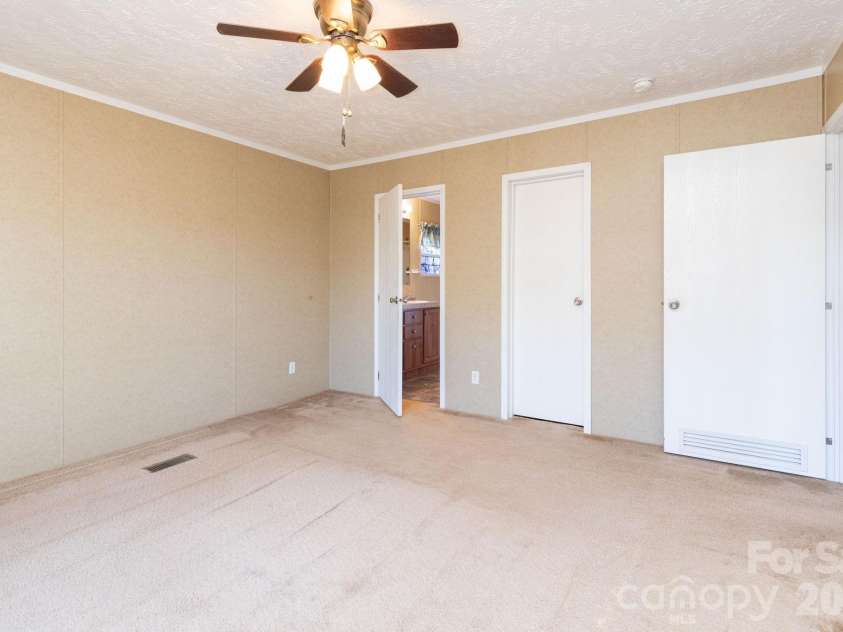 87 Hickory Nut Trace, Old Fort, NC 28762.  MLS# CAR4335774, YatesRealty ID 7435. Primary Bedroom