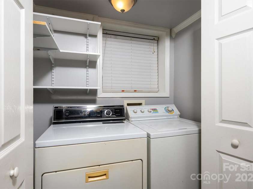 1501 Fern Forest Drive, Gastonia, NC 28054.  MLS# CAR4222511, YatesRealty ID 7440. Downstairs laundry