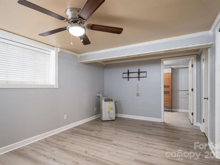 1501 Fern Forest Drive, Gastonia, NC 28054.  MLS# CAR4222511, YatesRealty ID 7440. Downstairs Primary Bedroom