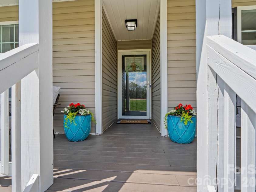 234 Planters Row Road, Iron Station, NC 28080.  MLS# CAR4361116, YatesRealty ID 7441. Front porch