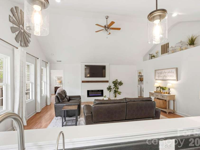 234 Planters Row Road, Iron Station, NC 28080.  MLS# CAR4361116, YatesRealty ID 7441. Kitchen overlooking the Great Room. 