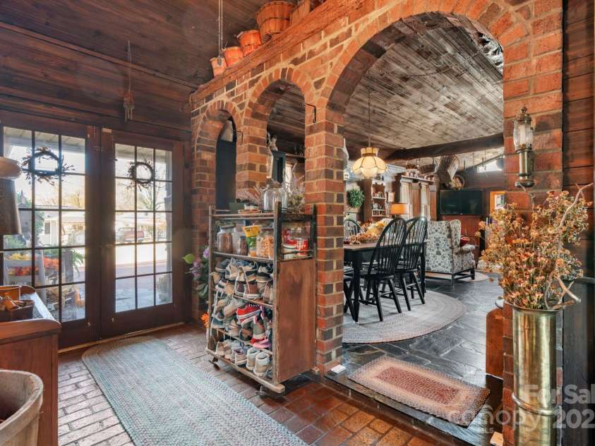 901 Union Street, Maiden, NC 28650.  MLS# CAR4322625, YatesRealty ID 7445. Brick arches frame the entryway into the large flex space
