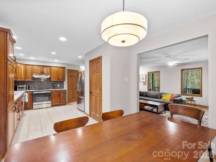581 Hubbard Hollow Road, Rosman, NC 28772.  MLS# CAR4341055, YatesRealty ID 7449. Open Concept Kitchen and Dining