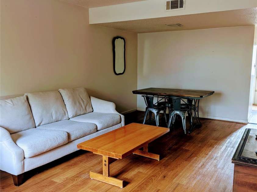 115 Eastcliff Drive, Concord, NC 28025.  MLS# CAR4220848, YatesRealty ID 745. Living and dining space.