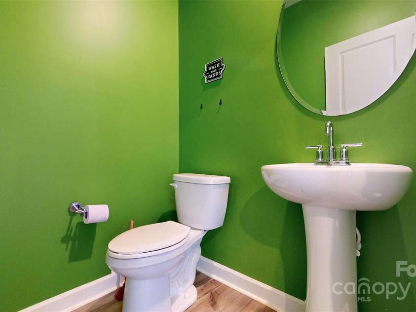 527 Palmarosa Street, Fort Mill, SC 29715.  MLS# CAR4320377, YatesRealty ID 745. Half bath on main floor
