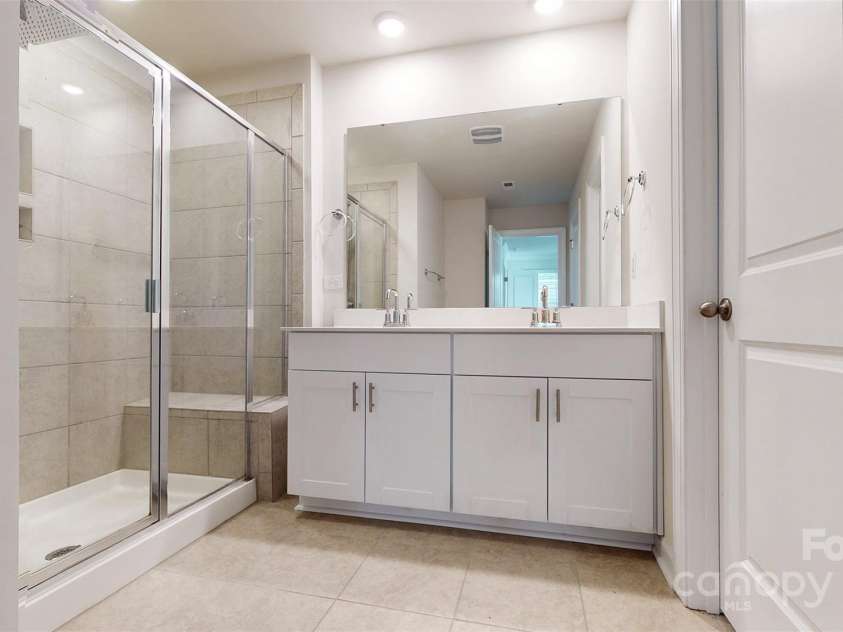527 Palmarosa Street, Fort Mill, SC 29715.  MLS# CAR4320377, YatesRealty ID 745. Primary Bathroom
