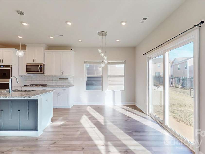 527 Palmarosa Street, Fort Mill, SC 29715.  MLS# CAR4320377, YatesRealty ID 745. Spacious dining area off the kitchen