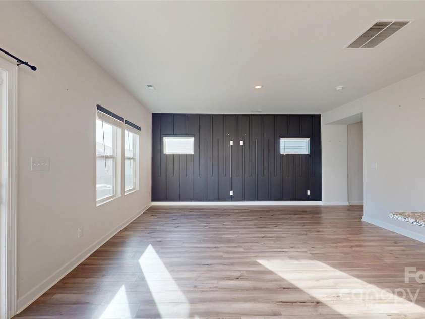 527 Palmarosa Street, Fort Mill, SC 29715.  MLS# CAR4320377, YatesRealty ID 745. View from dining area towards the Family Room