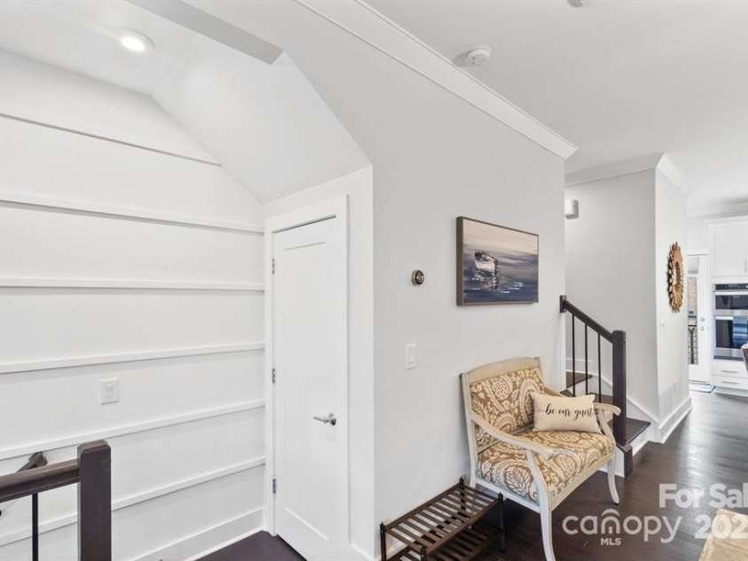 12119 Brooklyn Avenue, Charlotte, NC 28204.  MLS# CAR4300115, YatesRealty ID 7450. Stairs to the first floor livving room
