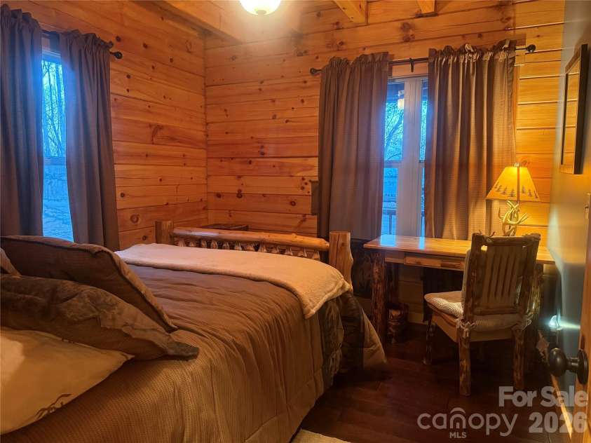 476 Double Eagle Drive, Nebo, NC 28761.  MLS# CAR4360435, YatesRealty ID 7450. Main level bedroom 