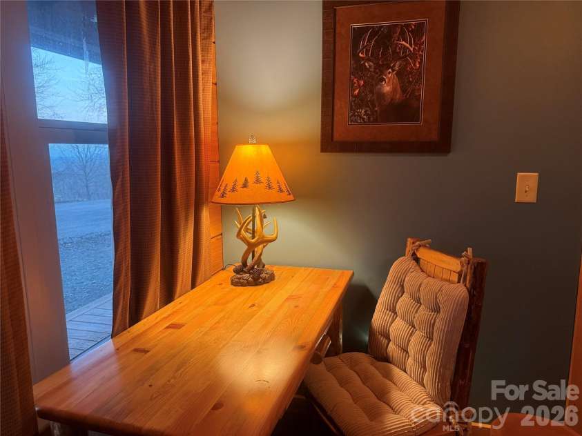 476 Double Eagle Drive, Nebo, NC 28761.  MLS# CAR4360435, YatesRealty ID 7450. Main level bedroom & desk 