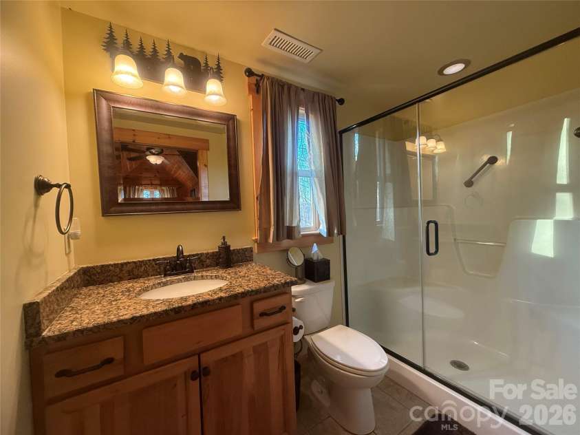 476 Double Eagle Drive, Nebo, NC 28761.  MLS# CAR4360435, YatesRealty ID 7450. Primary Bath