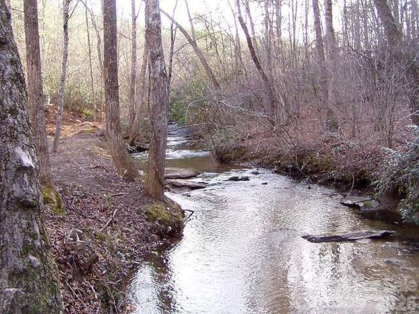 476 Double Eagle Drive, Nebo, NC 28761.  MLS# CAR4360435, YatesRealty ID 7450. Separate creek and picnic area