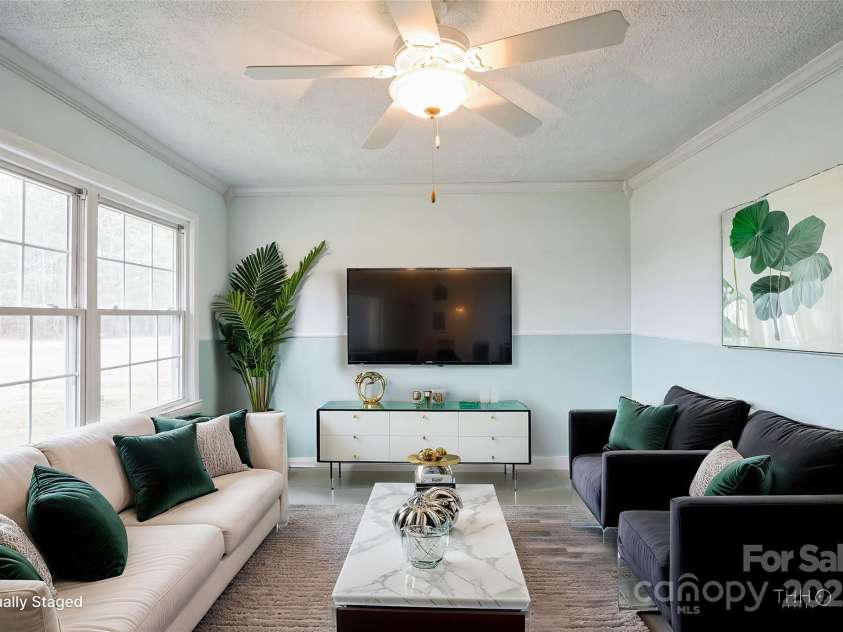 4926 Nc Highway 109 South, Mount Gilead, NC 27306.  MLS# CAR4214139, YatesRealty ID 7452. Living room virtually staged.
