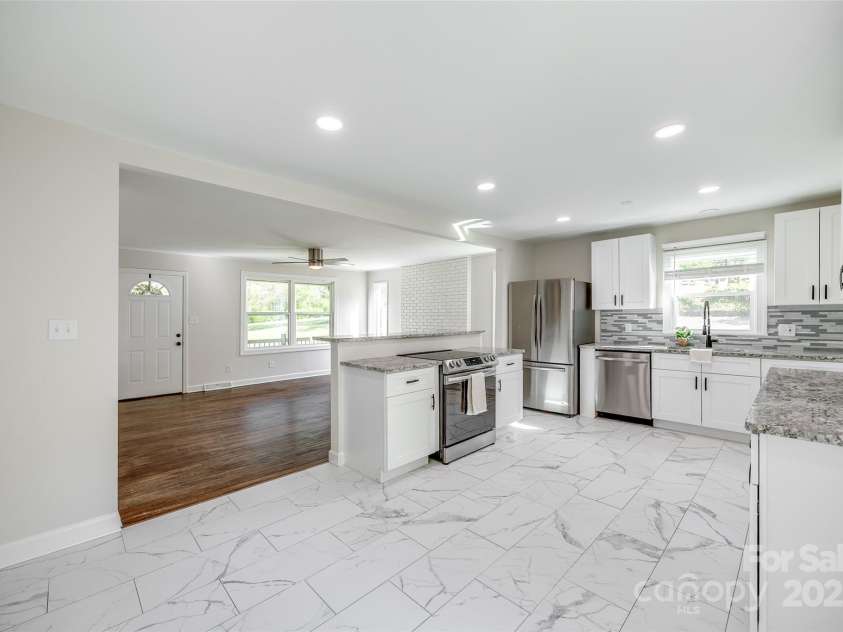 1849 Harris Road, Fort Mill, SC 29708.  MLS# CAR4241531, YatesRealty ID 7458. Kitchen with view to living room