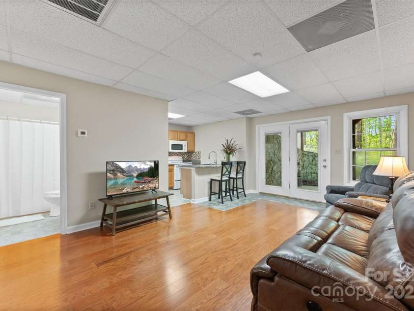 109 Wren Lane, Mooresville, NC 28117.  MLS# CAR4245335, YatesRealty ID 7464. Basement Living Room