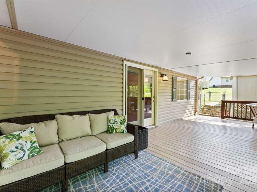 109 Wren Lane, Mooresville, NC 28117.  MLS# CAR4245335, YatesRealty ID 7464. Covered Deck off Master