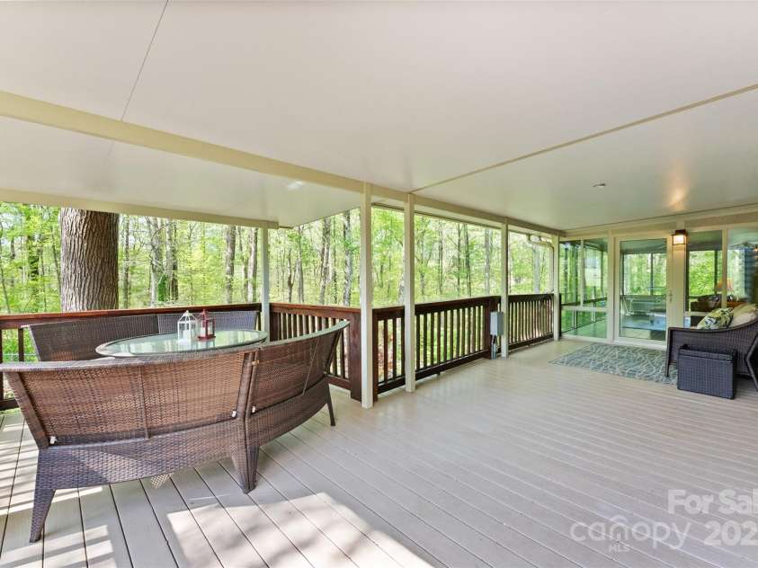 109 Wren Lane, Mooresville, NC 28117.  MLS# CAR4245335, YatesRealty ID 7464. Covered Dining area on back deck