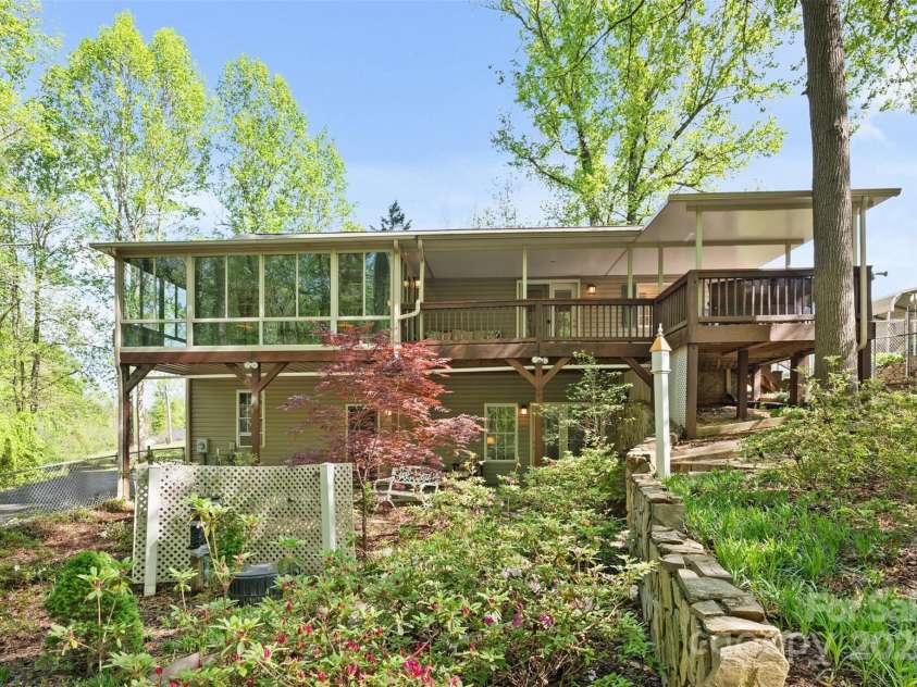 109 Wren Lane, Mooresville, NC 28117.  MLS# CAR4245335, YatesRealty ID 7464. Mature Landscape in the backyard
