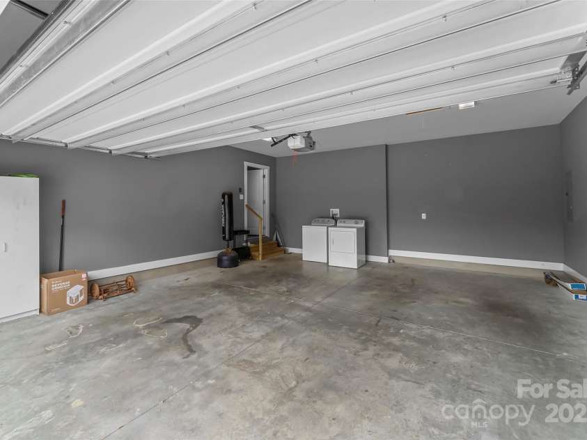 6 Meeting Street, Asheville, NC 28803.  MLS# CAR4266058, YatesRealty ID 7465. Oversized 2 car garage with laundry