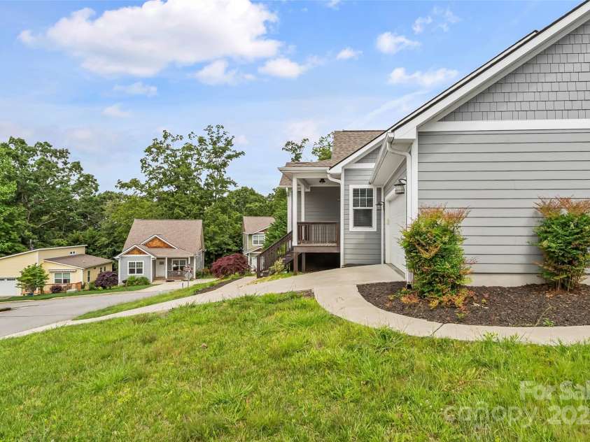 6 Meeting Street, Asheville, NC 28803.  MLS# CAR4266058, YatesRealty ID 7465. Paved sidewalk to ramp entrance