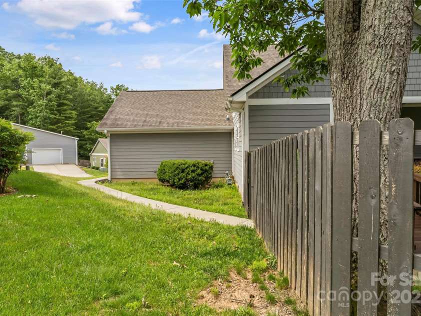 6 Meeting Street, Asheville, NC 28803.  MLS# CAR4266058, YatesRealty ID 7465. Paved sidewalk to ramp entrance