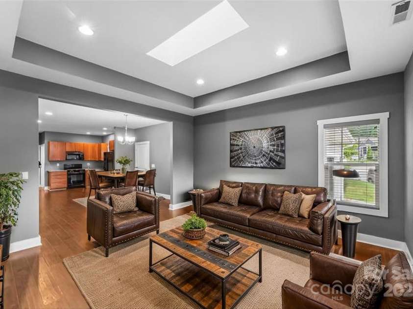 6 Meeting Street, Asheville, NC 28803.  MLS# CAR4266058, YatesRealty ID 7465. Virtually Staged Living into Dining