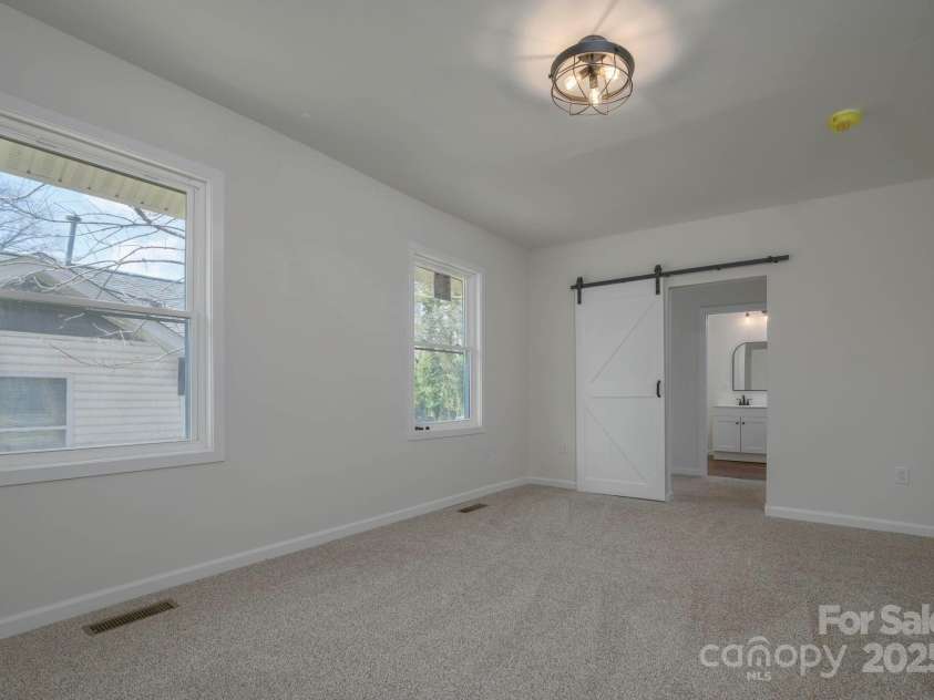 257 3rd Avenue, Hickory, NC 28602.  MLS# CAR4237724, YatesRealty ID 7466. Master bedroom