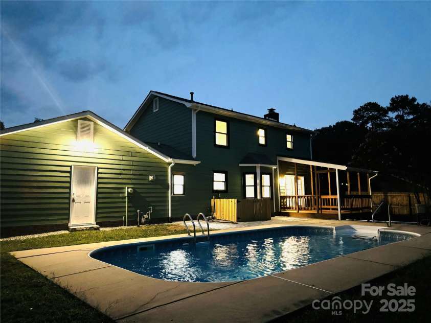 12620 Sulgrave Drive, Huntersville, NC 28078.  MLS# CAR4249153, YatesRealty ID 7473. Night View of Back of Home