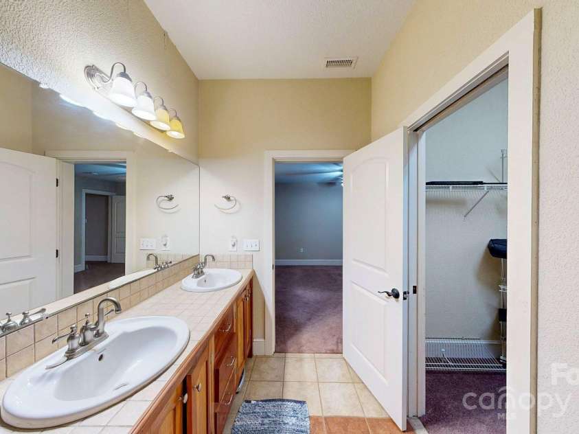 6 Sunrise Valley, Leicester, NC 28748.  MLS# CAR4283211, YatesRealty ID 7475. Basement Bathroom