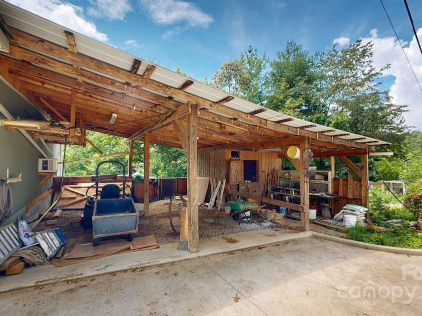 6 Sunrise Valley, Leicester, NC 28748.  MLS# CAR4283211, YatesRealty ID 7475. Lawn Tractor Shed